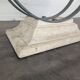 1980s coffee table with a travertine style and glass top.