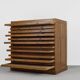 Vintage industrial oak filing cabinet with several drawers, 1930s.