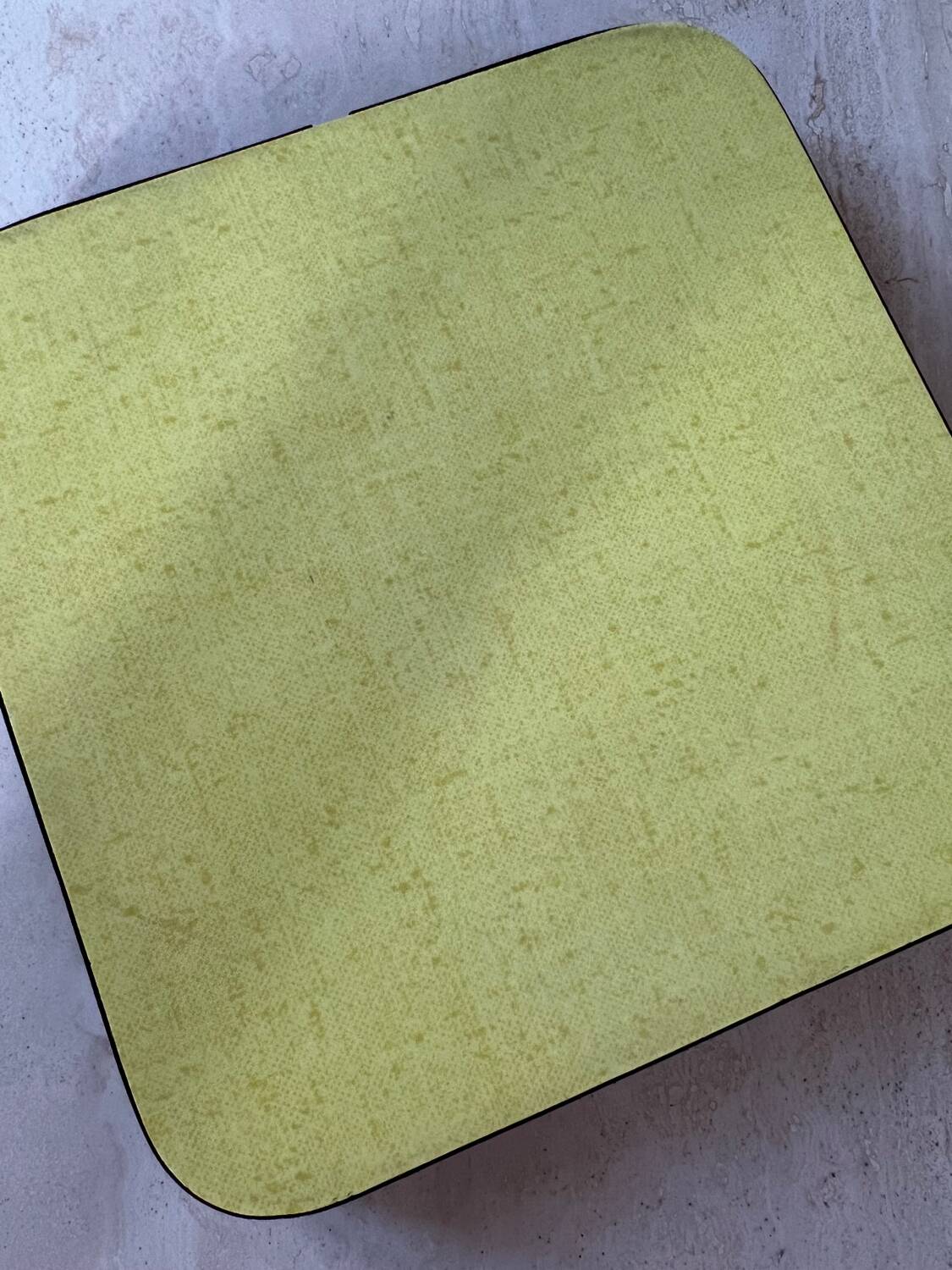 Yellow Formica trivet