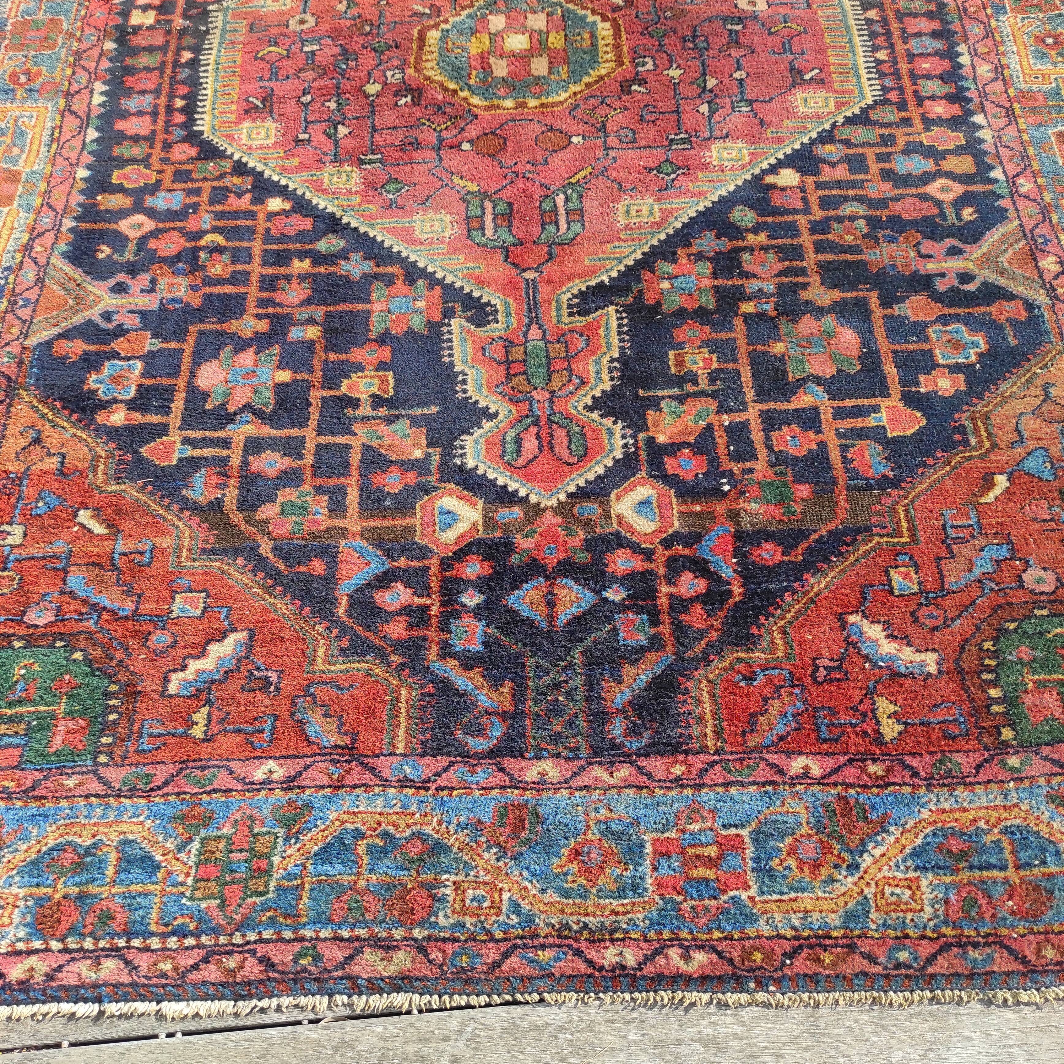 Old Persian carpet 1.62 m wide and 2.33 meters long