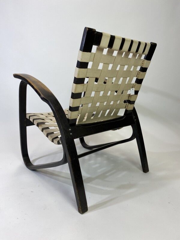 Vintage black lounge chair by Jan Vaněk