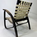 Vintage black lounge chair by Jan Vaněk