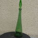 Vintage green faceted glass bottle with its cap 1970