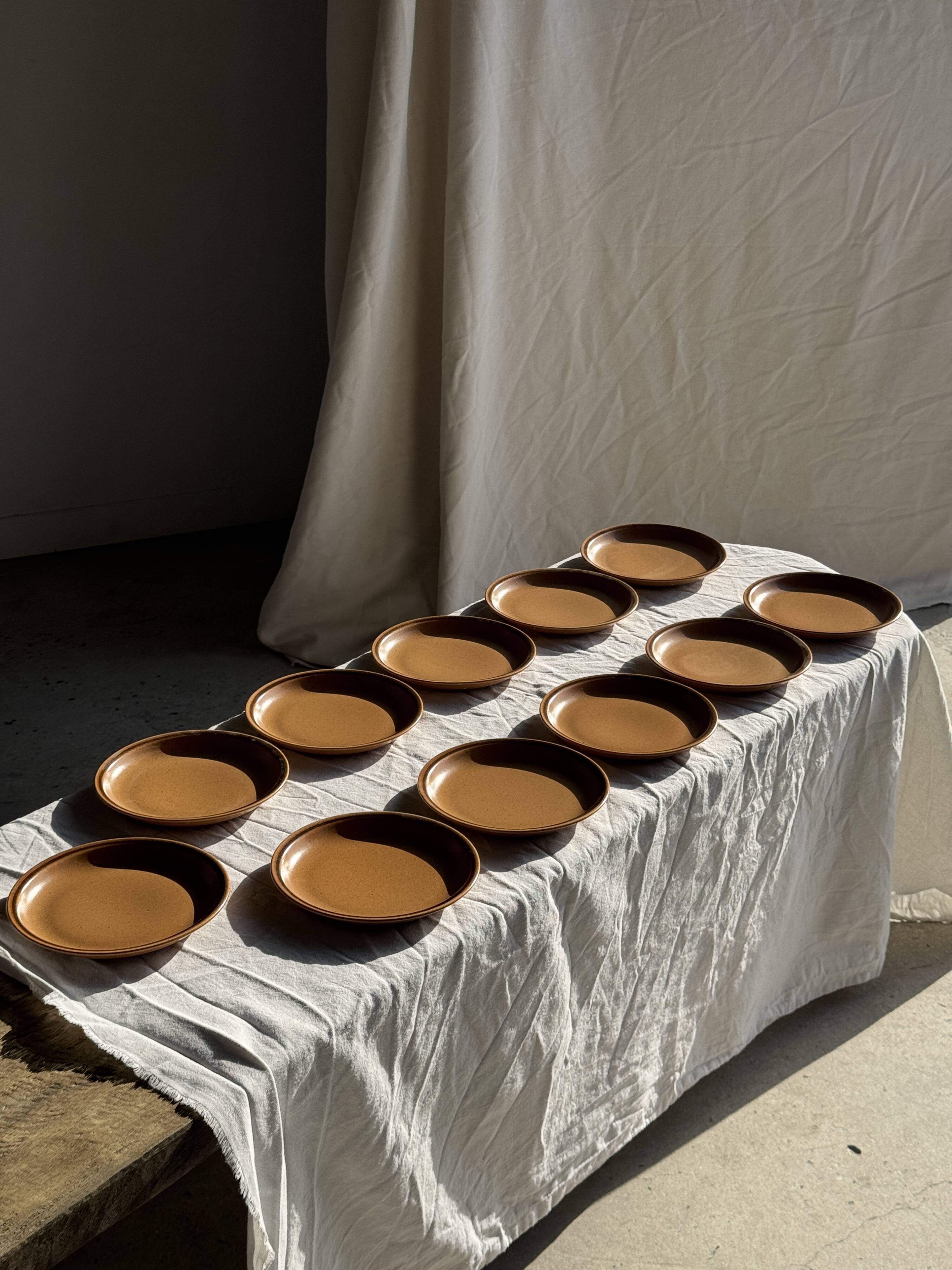 Set of 11 small dessert plates in brown-striped stoneware from Sarreguemines.