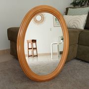 Vintage oval mirror in beech from the 70s/80s.