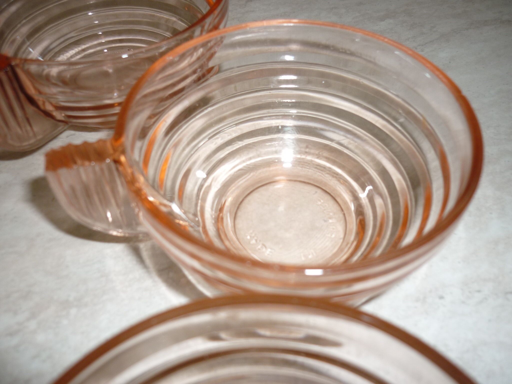 Lot 9 art deco cups in pink transparent glass