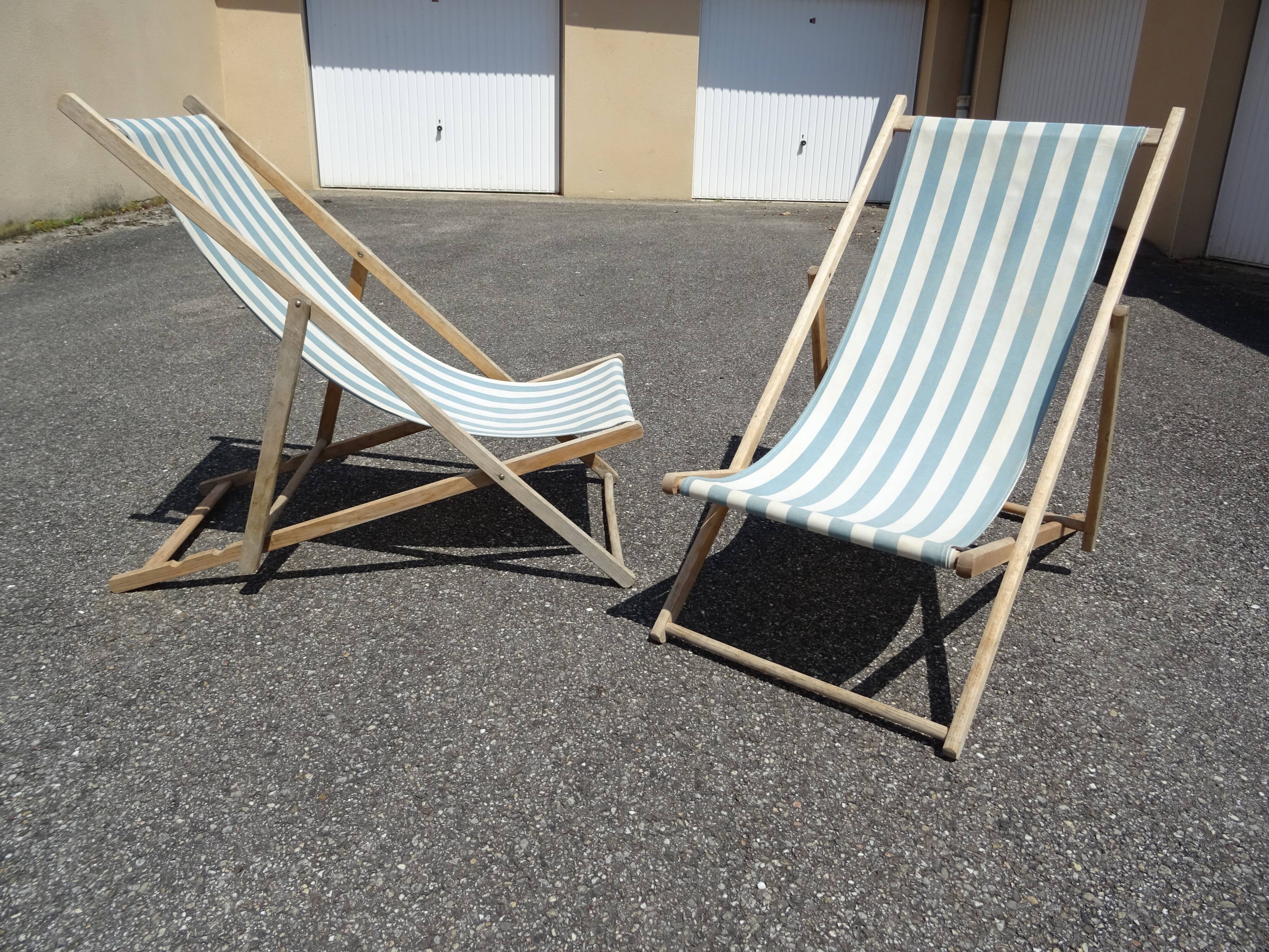 Pair of sun loungers with vintage blue blue stripes