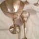 Set of 6 mini goblets on a pedestal in Art Deco style made of silver-plated metal with crests.