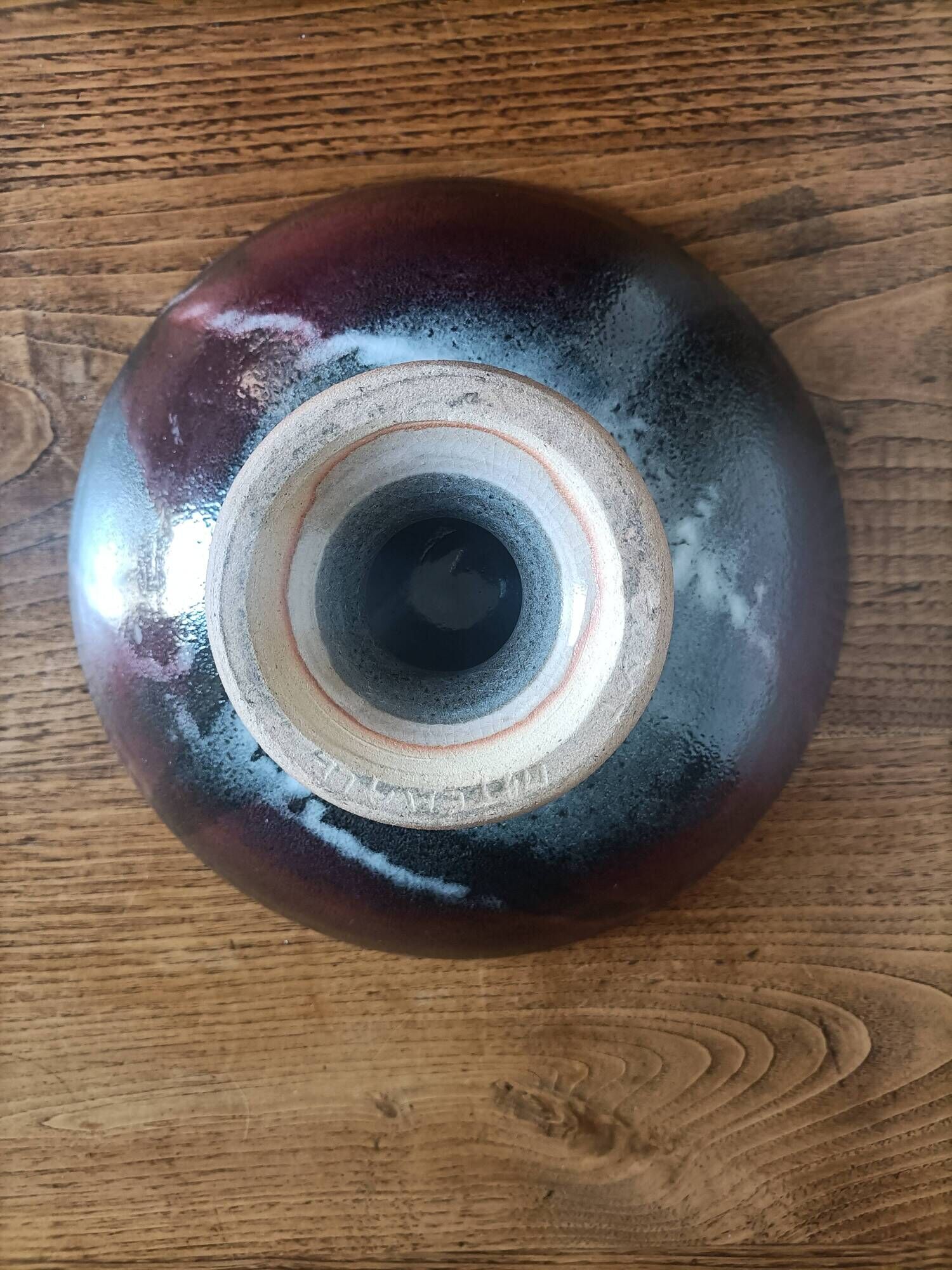 Signed ceramic fruit bowl on foot