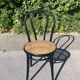 Curved wooden canework chair