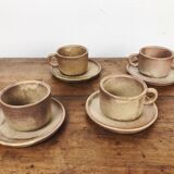 4 sandstone cups with under cups