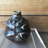 Small Dalpayrat vase shaped ball in polychrome glacured ceramic with relief decoration of a flower signed under the base