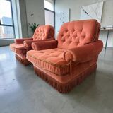 Set of 2 vintage old rose armchairs with fringes.