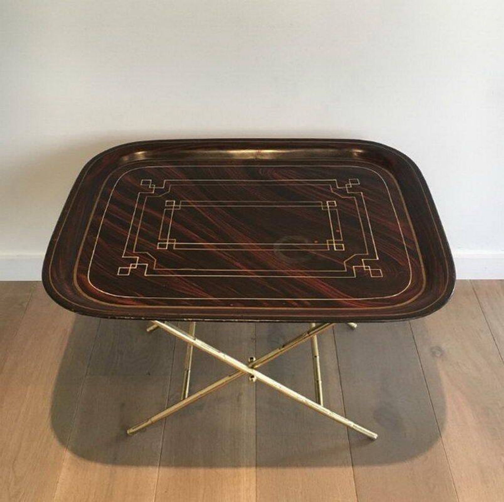 Beautiful table with a brass top and painted sheet metal