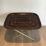 Beautiful table with a brass top and painted sheet metal