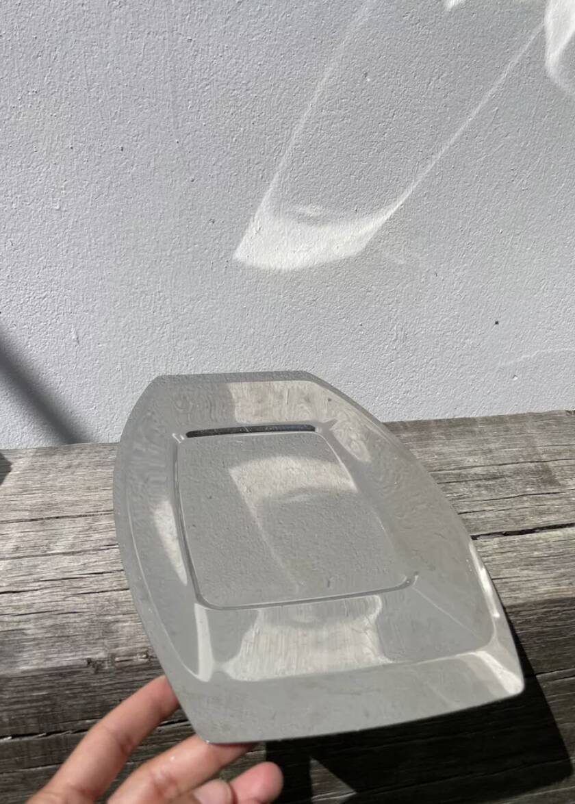 Rectangular stainless steel dish by Rémy Letang