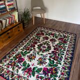 White vintage floral rug made by hand in Romania, beautiful flowers