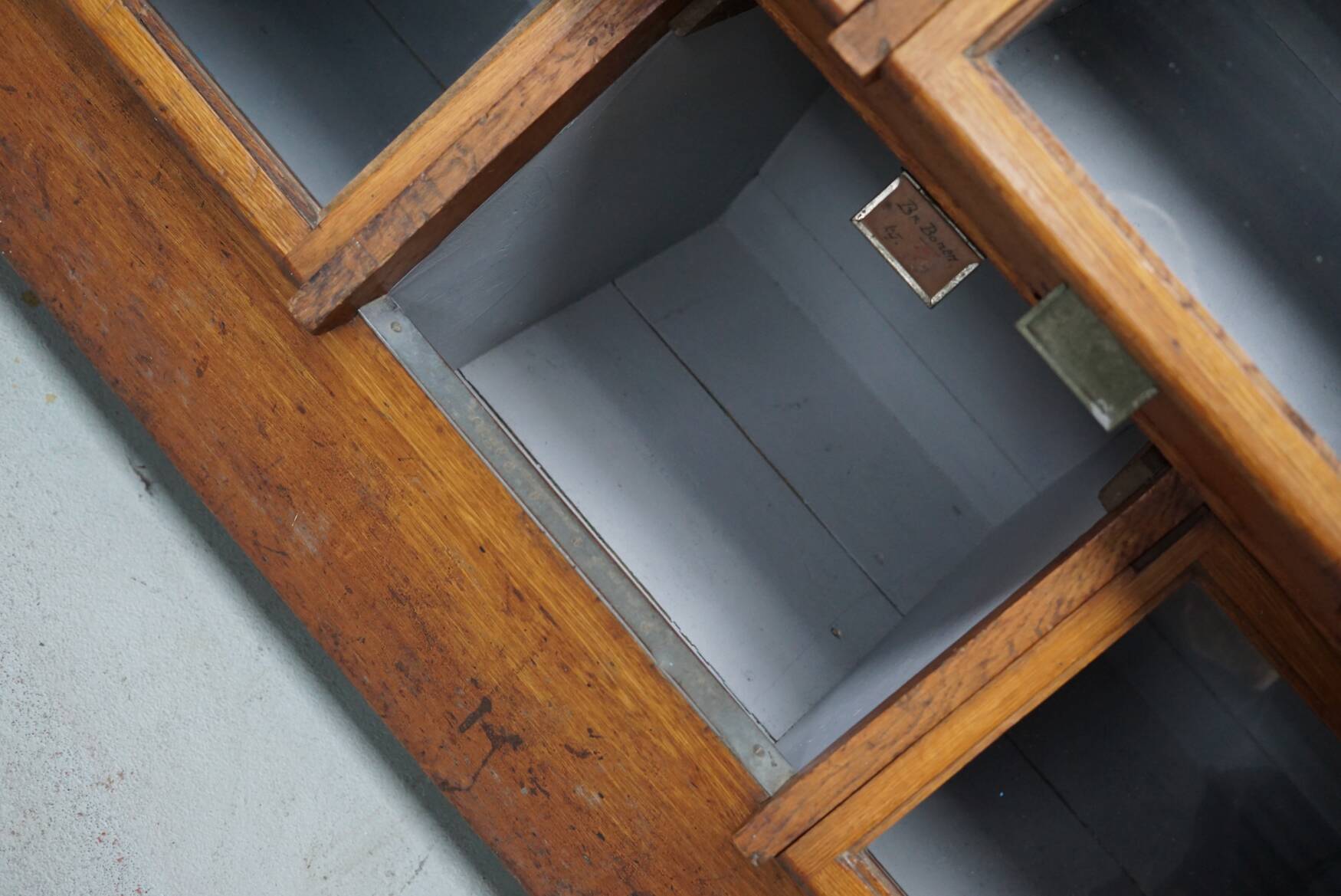 Very large Dutch oak showcase for grocery or haberdashery, 1920s-1930s