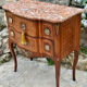 Small jump cabinet in precious wood marquetry.