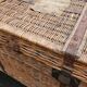 Antique vintage rattan and wicker travel trunk from the 1900s