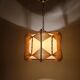 Raffia and wood ceiling lamp. Spain, 1970s.