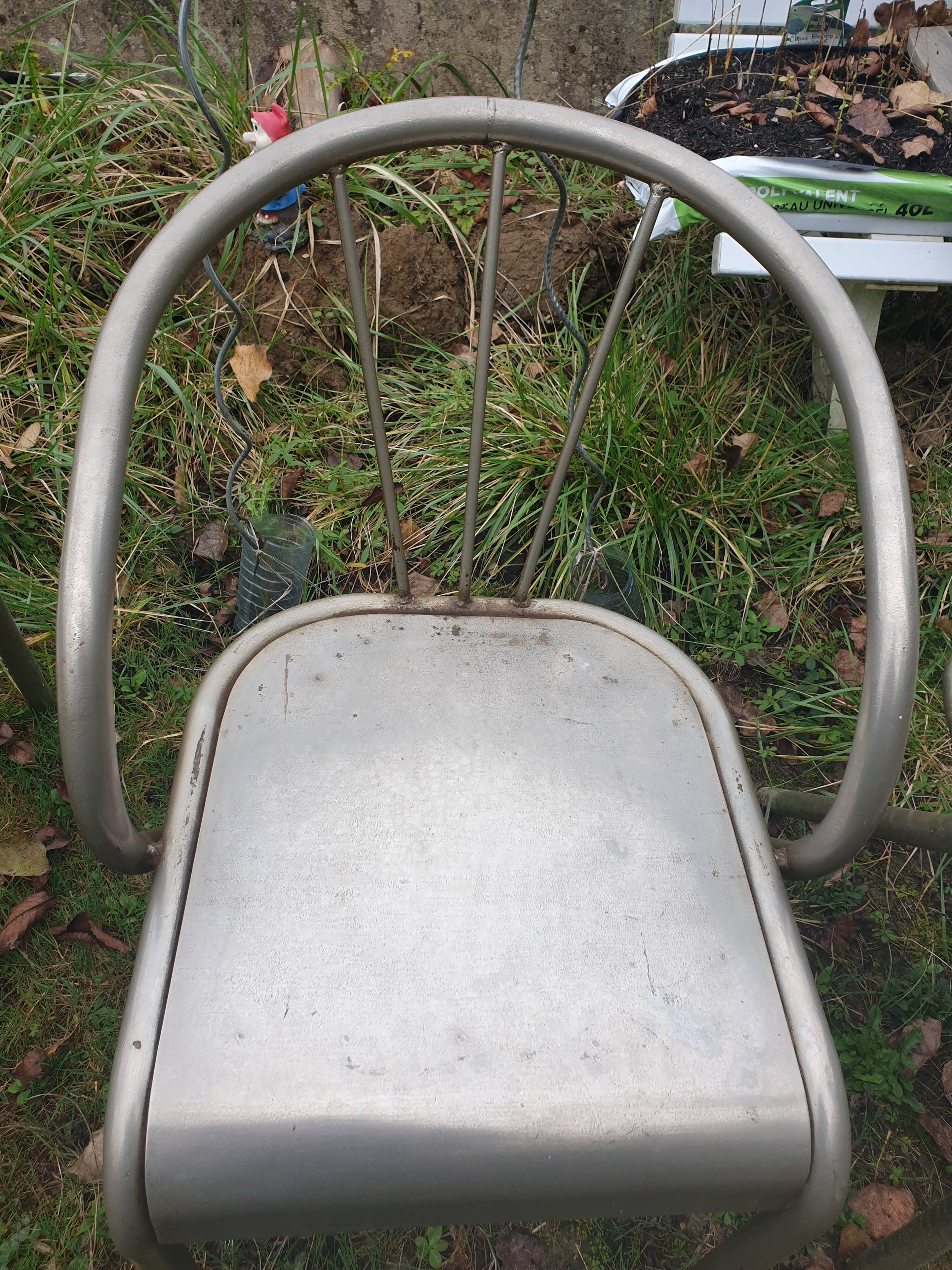 4 seventies welded tubular steel armchairs