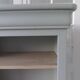 Louis Philippe style bookcase reenchanted in verdigris, 3 light oak waxed shelves.