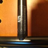 Coste mahogany and black armchair