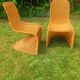 Pair of rattan chairs in the style of Verner Panton
