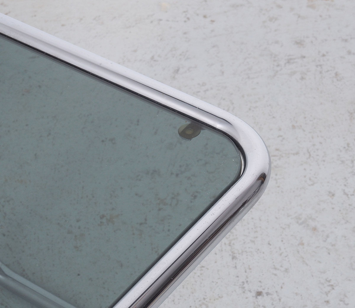 Vintage chromed nesting tables with smoked glass