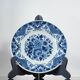 Vintage plate made of hand-painted earthenware.