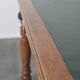 Antique writing table / partner desk with 4 drawers and a green leather top