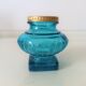 Encrier ancien en verre turquoise et laiton