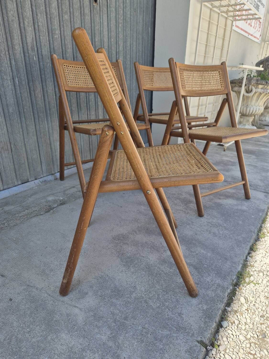 Set of 4 vintage Italian folding chairs in cane 1970s