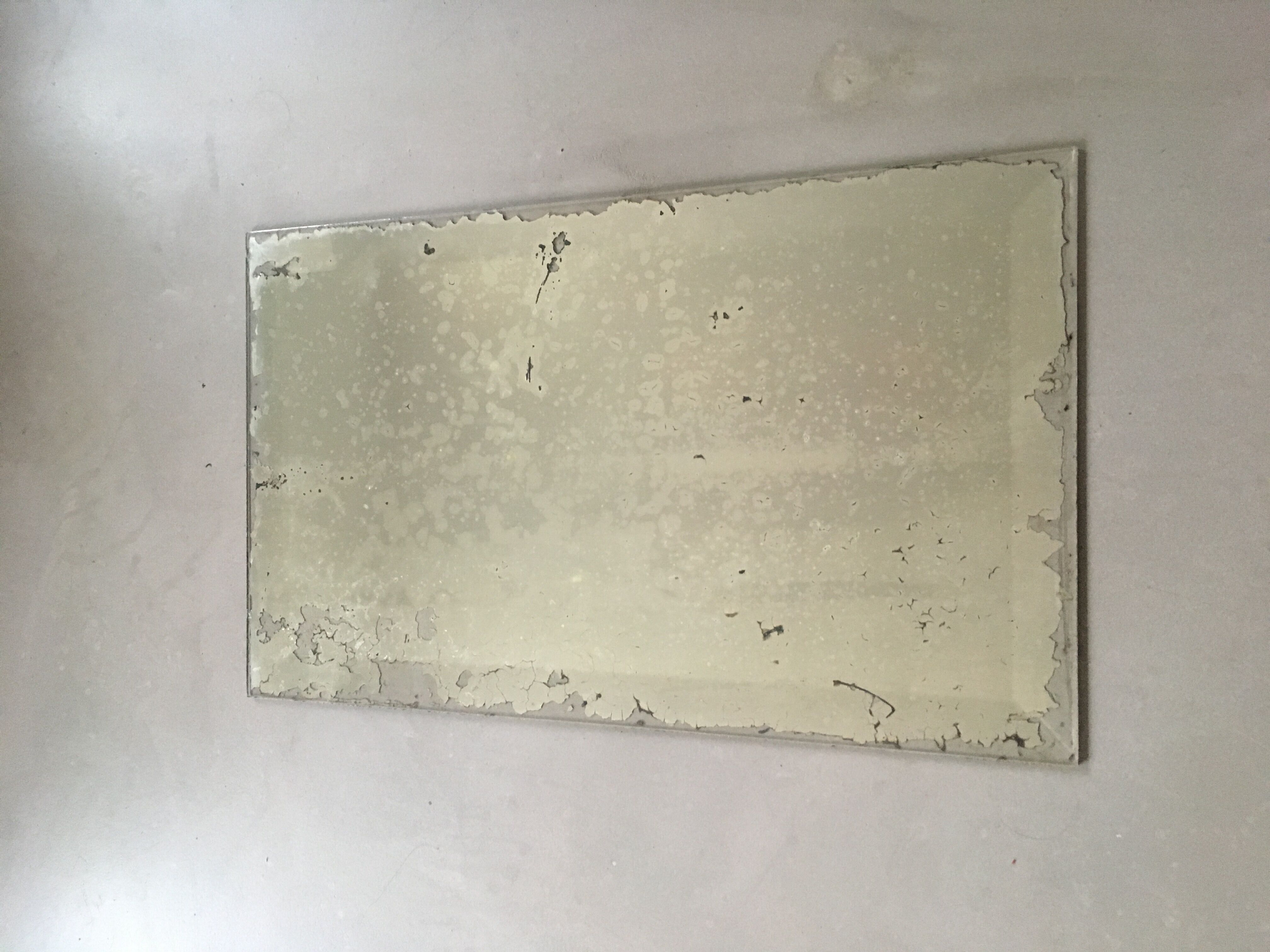 Miroir ancien piqué biseauté 36 x 51 cm