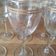 Set of 6 glasses with gold band decorations.