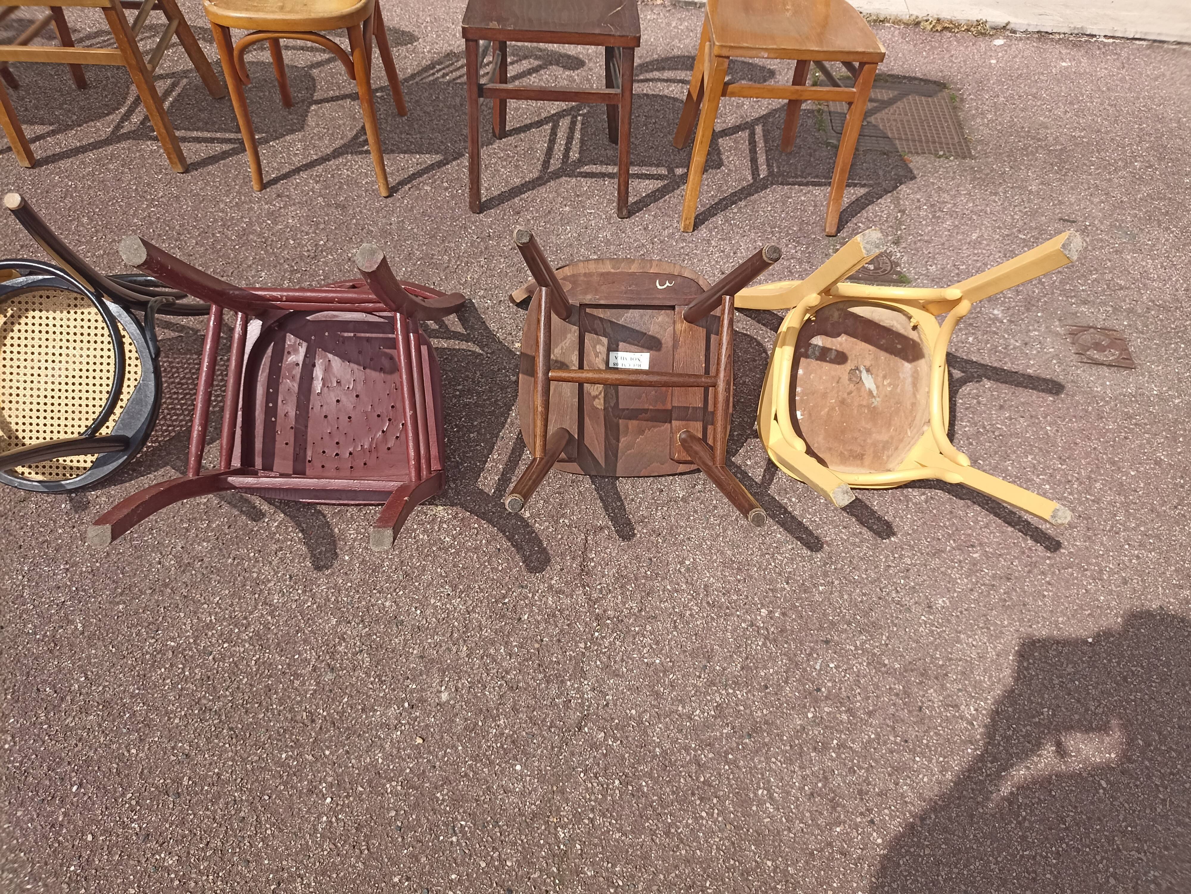 Set of 12 mismatched wooden bistro chairs