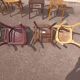 Set of 12 mismatched wooden bistro chairs