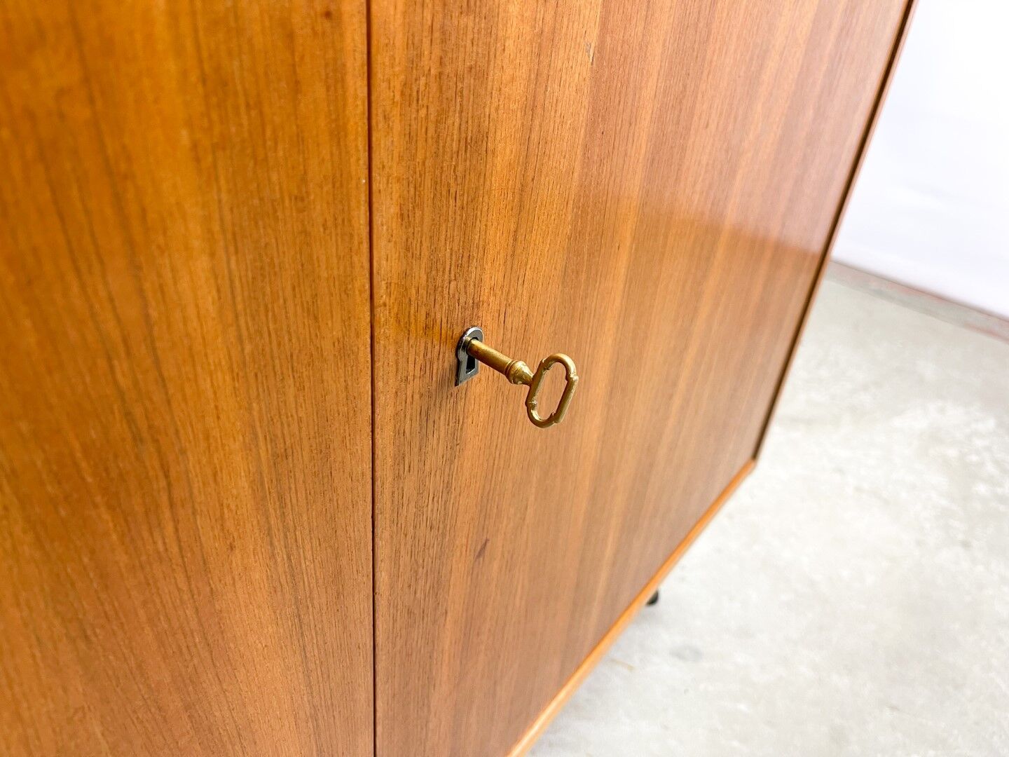 High vintage cabinet with hairpin legs