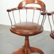 Set of 2 swivel/office chairs with a cognac-coloured cow leather seat