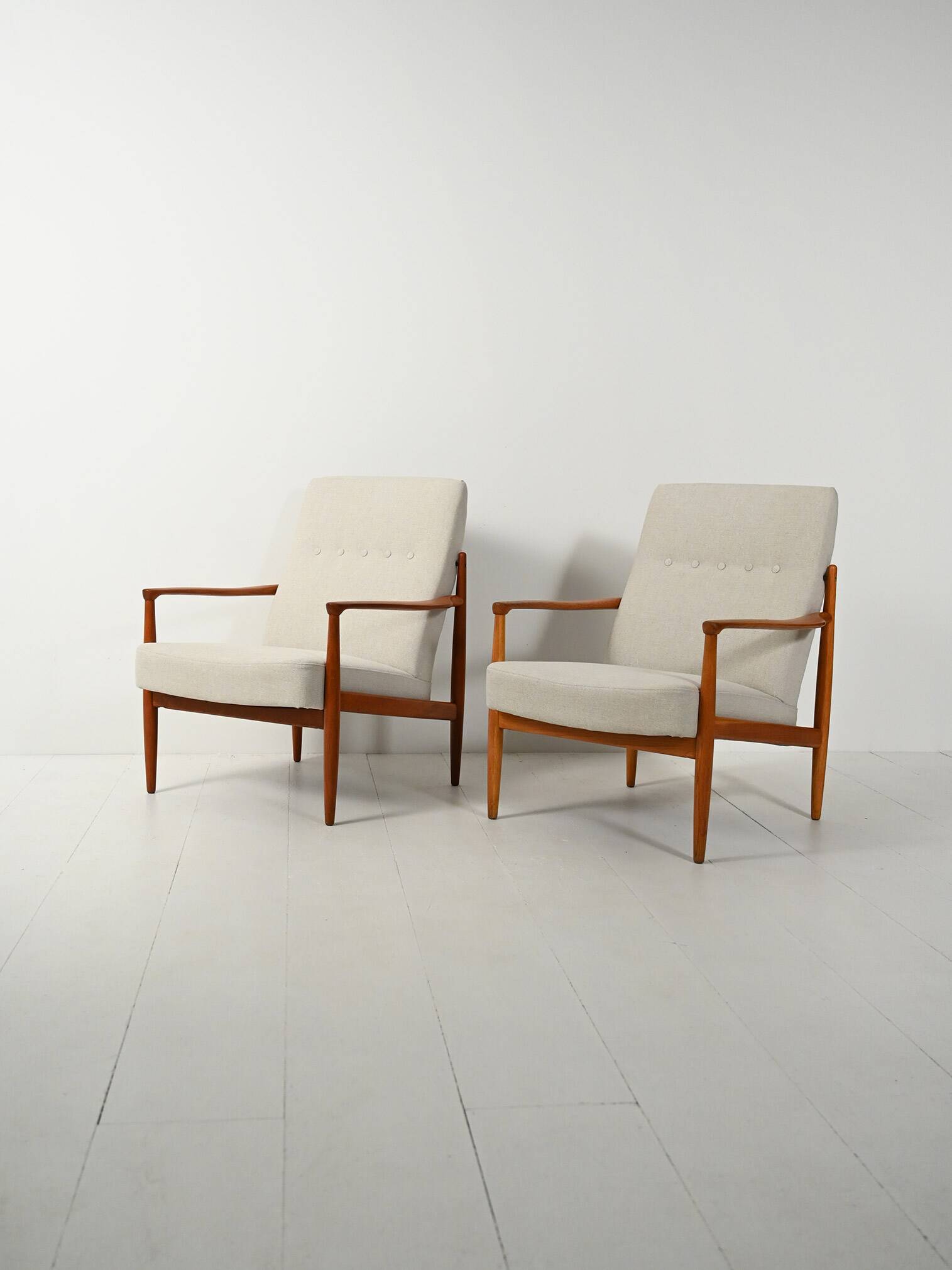 Pair of Scandinavian teak armchairs, 1950s–60s