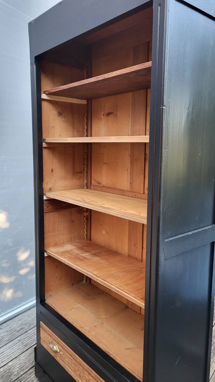 Two-tone black and honey bookcase