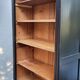 Two-tone black and honey bookcase