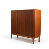 Armoire danoise à porte tambour en teck des années 1950