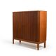 Armoire danoise à porte tambour en teck des années 1950