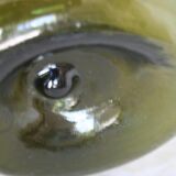 Blown green demijohn