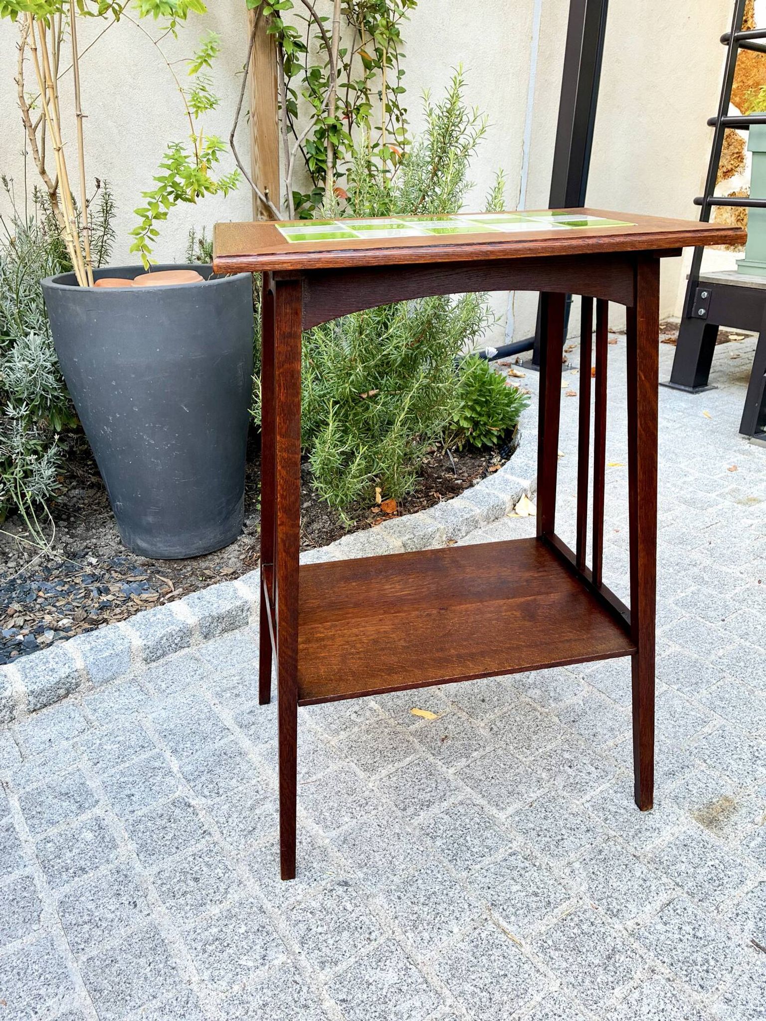 Art Nouveau side table 1910 with double tops in dark oak.