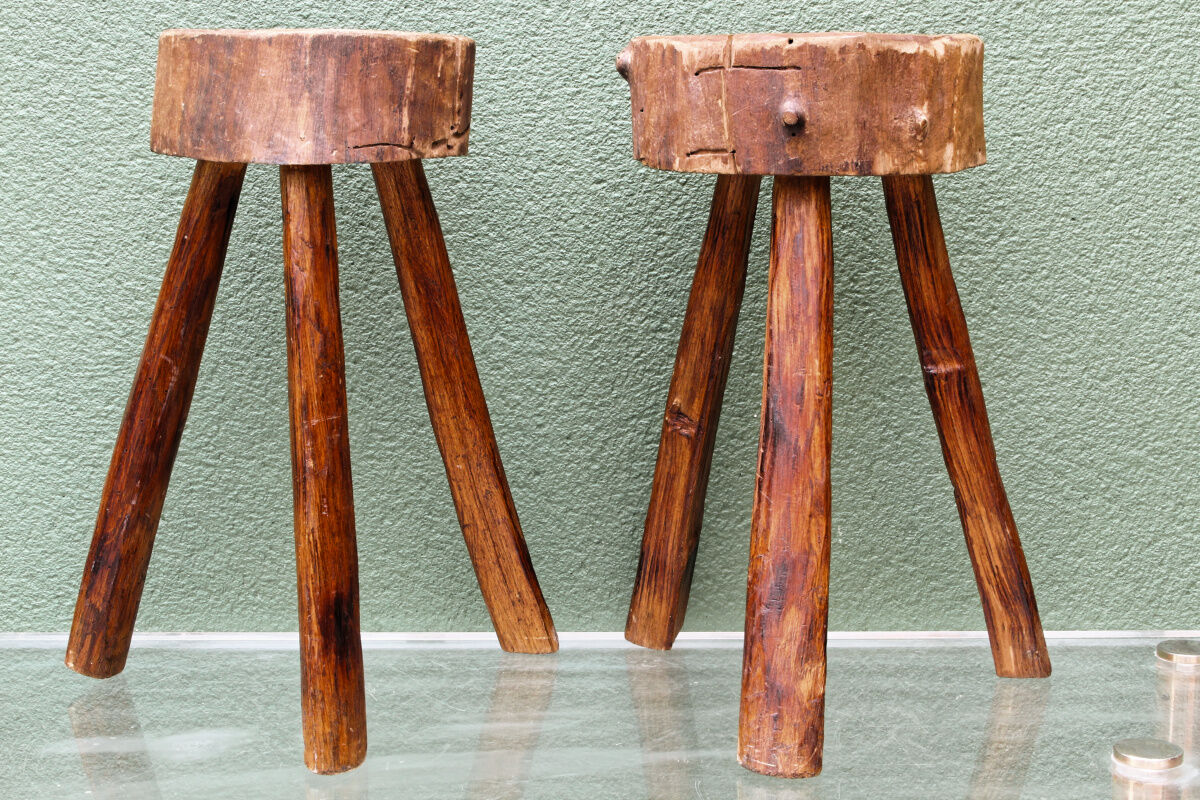 Pair of brutalist stools, tripods
