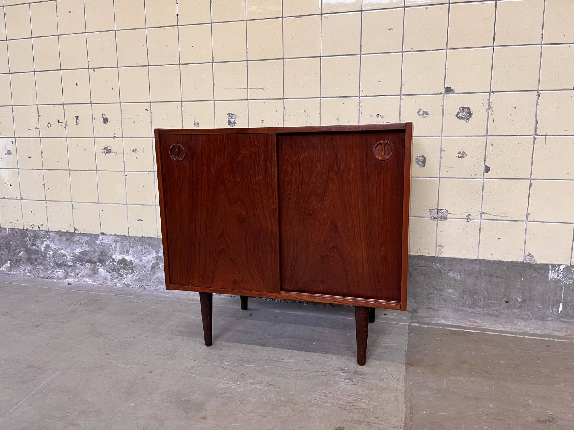 Vintage Danish cabinet with sliding doors