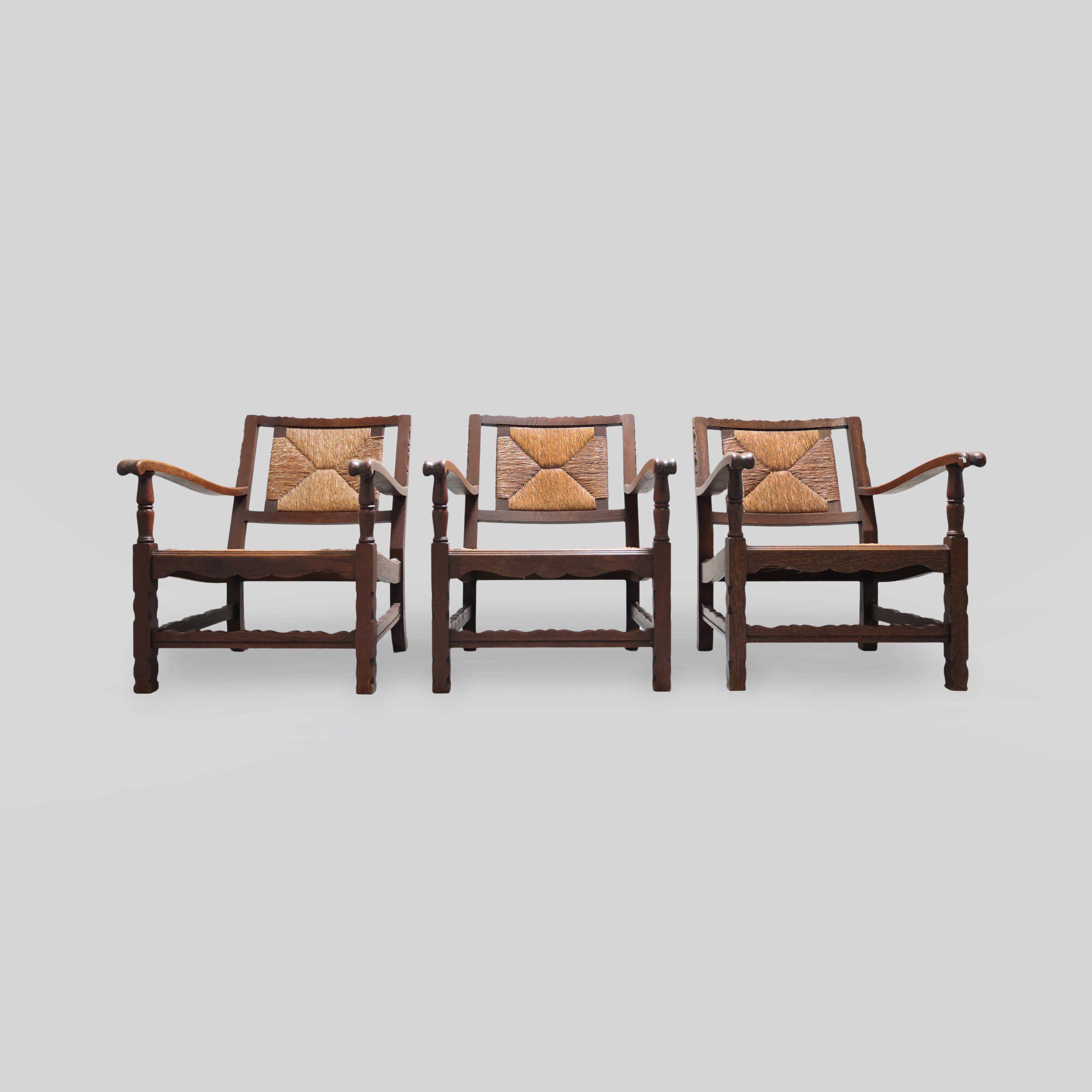 Mid-century rustic wooden armchairs with woven seat and back